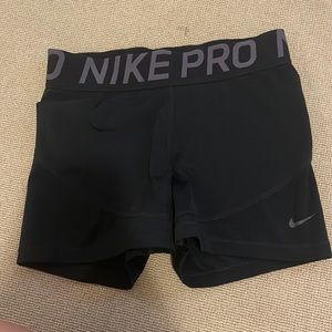 Nike pros. black. thick waste band. size medium